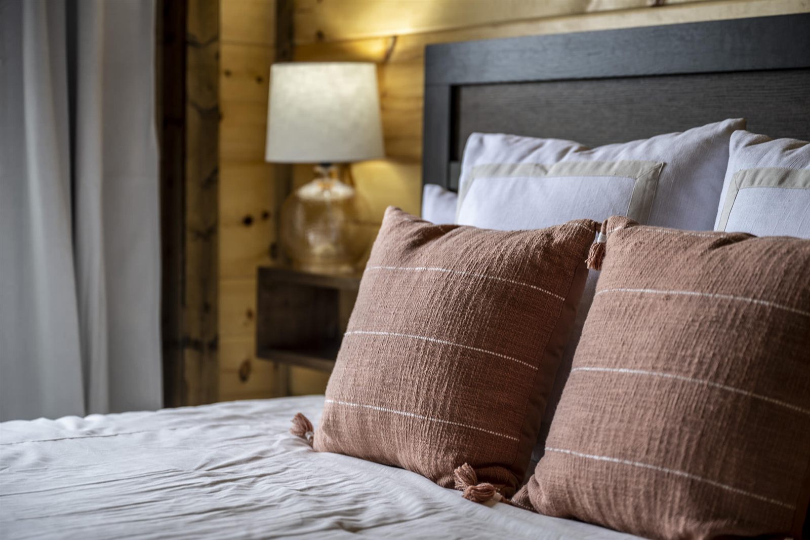 Bedroom styling detail with textured pillows